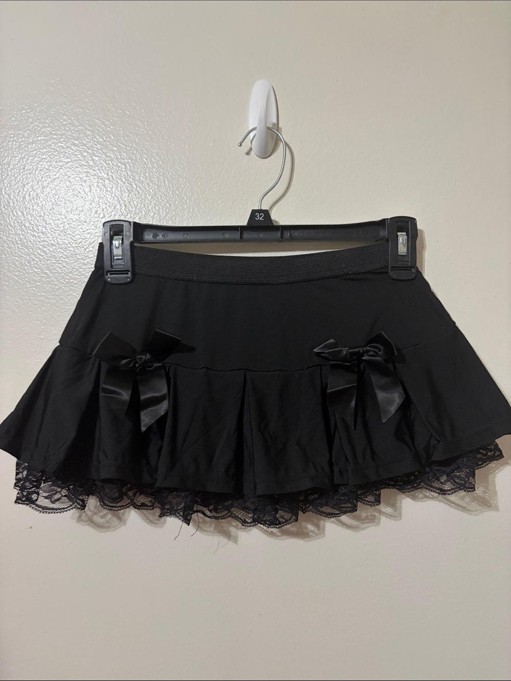 Spencer's Black Mini Skirt with Lace Hem and Satin Bows